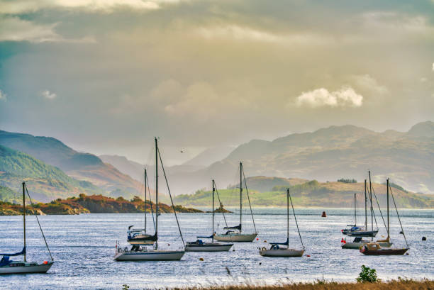 Looking at the harbor of Kyleakin who is a village situated on the east coast of the Isle of Skye in the Inner Hebrides, Scotland. The village is along the strait of Kyle Akin opposite the northwest Scottish mainland town of Kyle of Lochalsh.