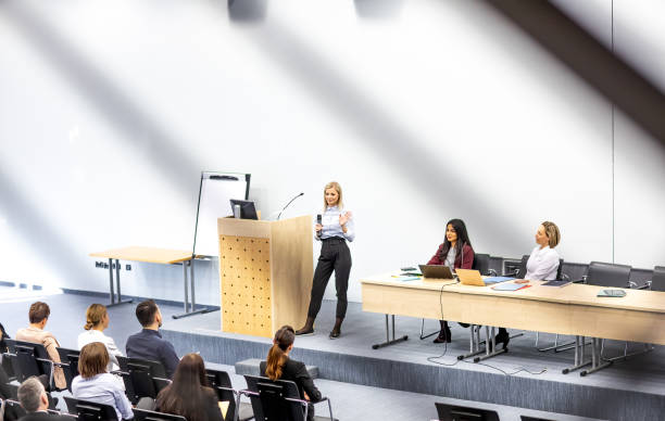 istock Business people at a conference event 1207018150