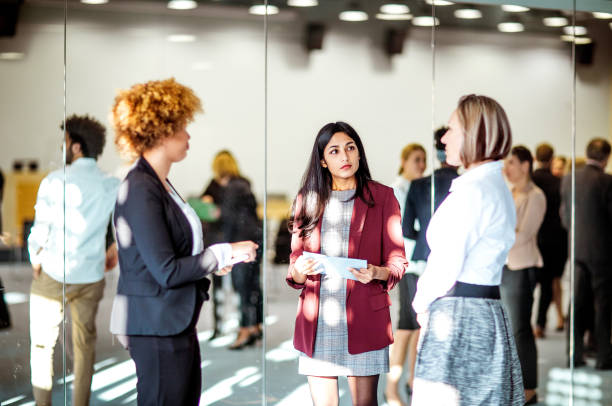 istock Business people at a conference event 1207020362