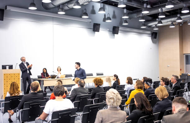 istock Business people at a conference event 1207020430