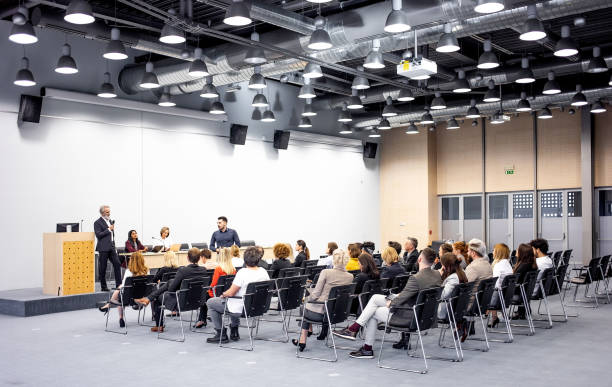 istock Business people at a conference event 1207020452