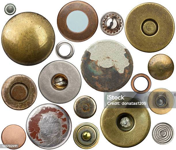 A Variety Of Vintage Jean Buttons On White Background Stock Photo