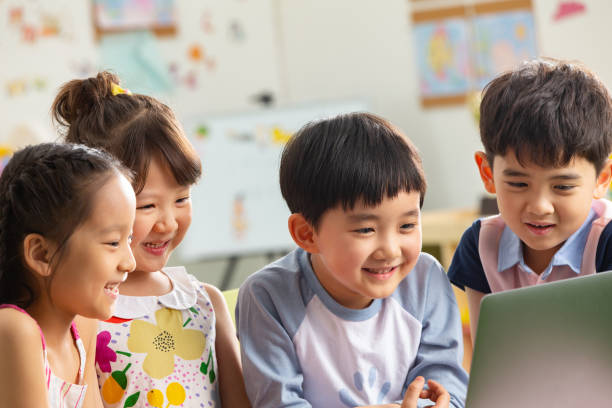 istock The kindergarten children watch video 1207025920