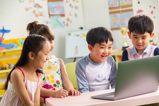 istock The kindergarten children watch video 1207025929