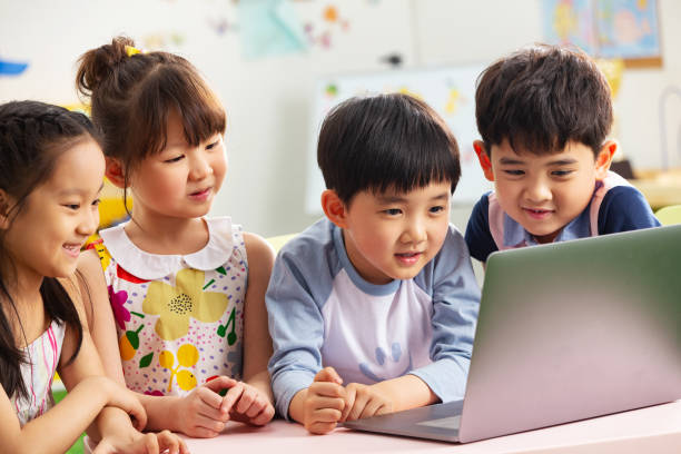 istock The kindergarten children watch video 1207025931