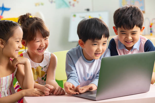 istock The kindergarten children watch video 1207025934