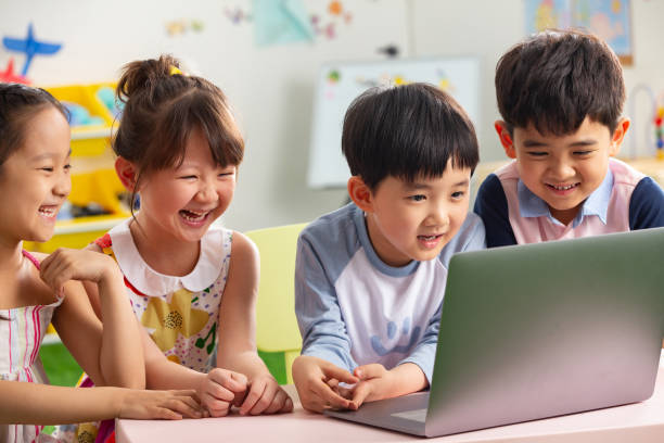 istock The kindergarten children watch video 1207025959