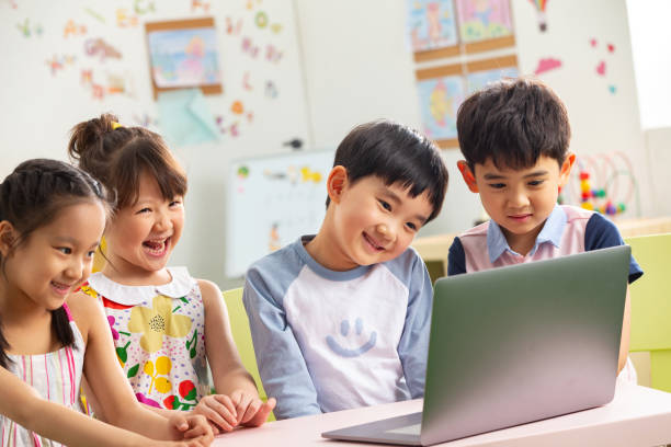 istock The kindergarten children watch video 1207025963