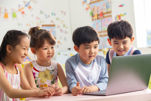 istock The kindergarten children watch video 1207025995
