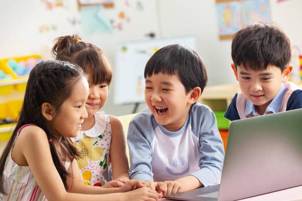 istock The kindergarten children watch video 1207026012