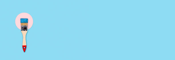 istock Blue background with paint brush and circle. 1207027657