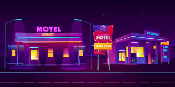 istock Night roadside motel with parking and oil station 1207032171