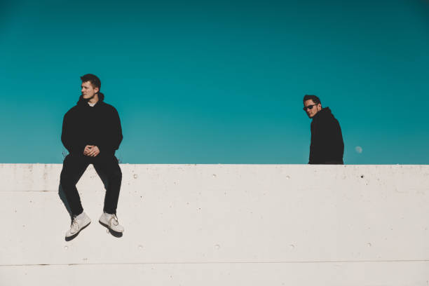 istock Cool Teenage Young Men on Garage Rooftop 1207032283