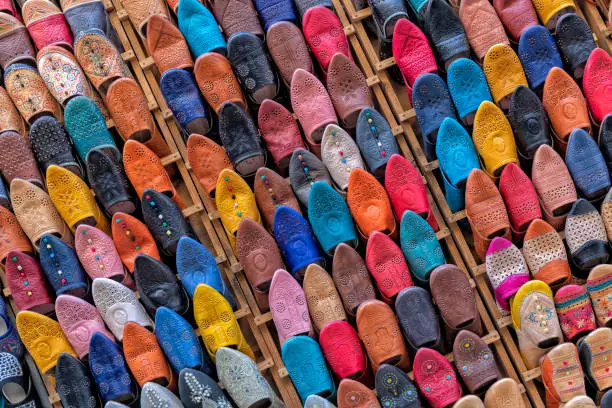 Colorful traditional Moroccan slippers (babouche), in the medina of Fez, Morocco.