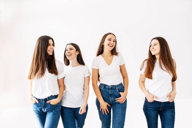istock Happy young girls talk and smile 1207033555