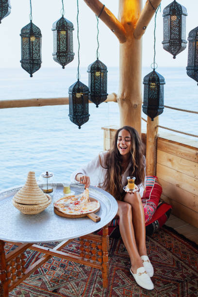 istock Woman relaxing in moroccan interior. 1207033864