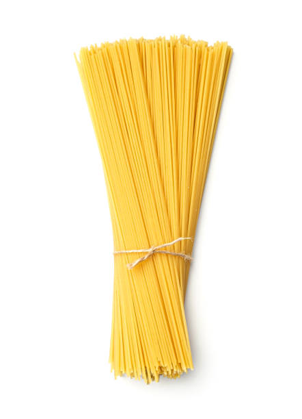 istock Pasta, ready for cooking. Isolated on white background. Top view. Flat lay 1207033922