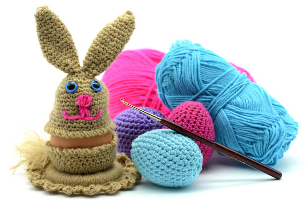 Easter bunny egg cup. Crochet of wool. Isolated background