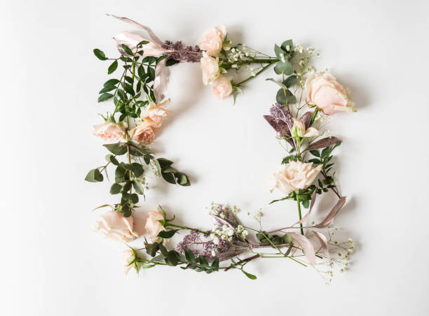istock Frame colorful various flowers and leaves on a white background. Top view. Copy space 1207036653