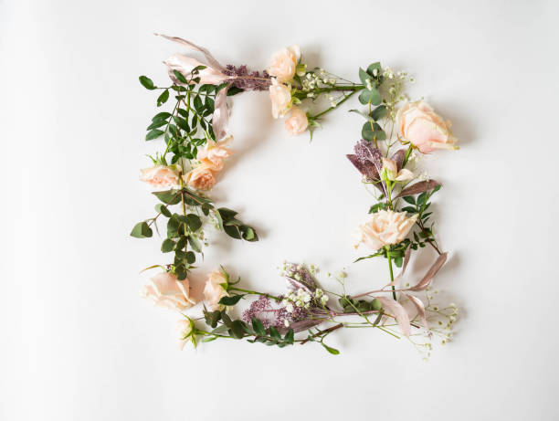 istock Frame colorful various flowers and leaves on a white background. Top view. Copy space 1207036654