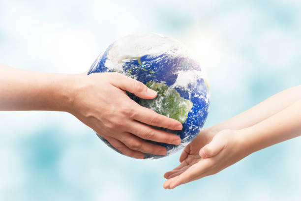 istock Earth globe in hands. World environment day 1207037966