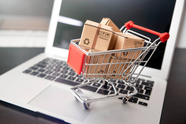istock e-commerce, shopping trolley with paper boxes 1207038079