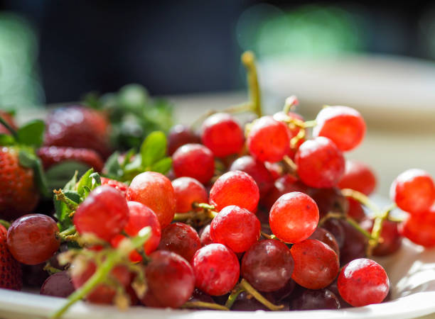 collection of black grapes in a plate