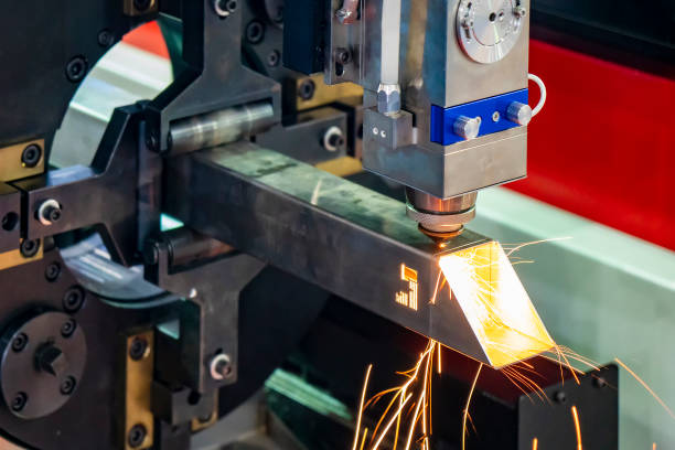 istock The fiber laser cutting machine cutting the stainless square tube control by CNC program. 1207040426