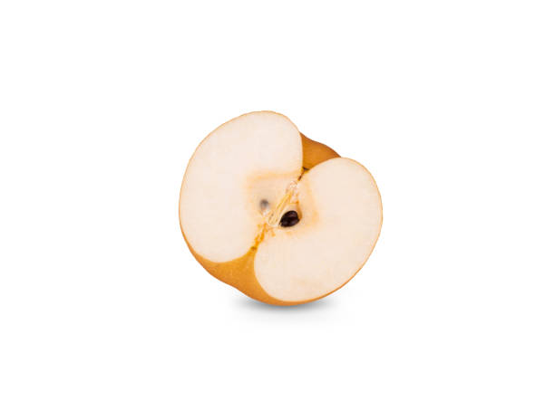 istock half cut ripe snow pear or Fengsui pear on white background 1207042441