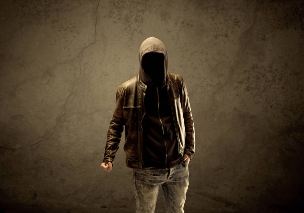istock Undercover hooded stranger in the dark 1207043936