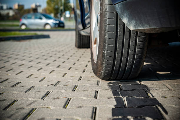 istock Black tire tracks on the pavement after drifting 1207043954
