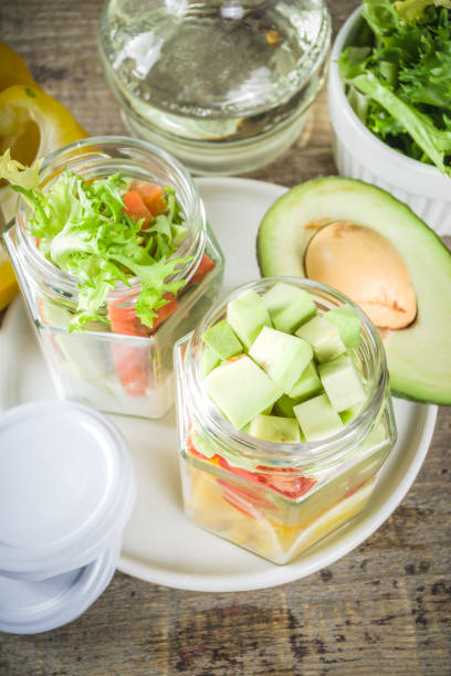 istock Healthy vegetable salad in jars 1207046512