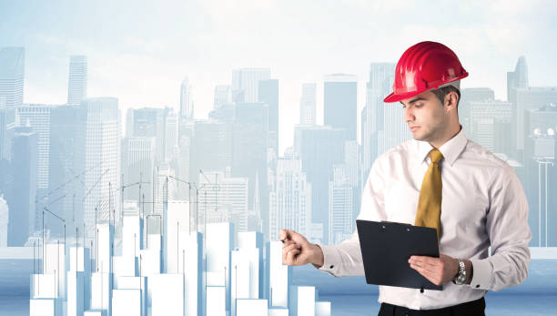 istock Businessman drawing skyscrapers 1207046645