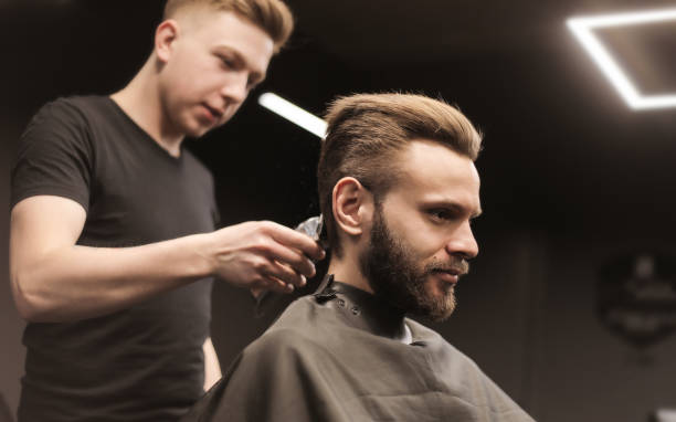 istock Shaving back of the head. 1207048513