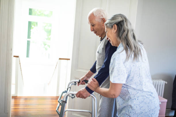 istock Wife helps her husband to recover quickly with her help 1207051255