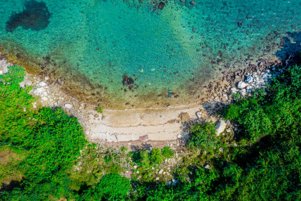 istock Small rocky island as seen from above 1207051816
