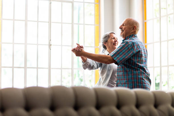 Shall we dance forever? Argentinian, married, elderly couple dancing during at home senior lifestyle stock pictures, royalty-free photos & images