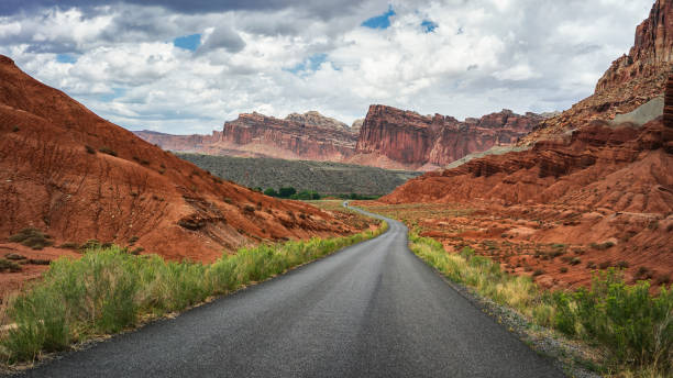 Summer vacations in USA outdoors: driving the highways of great South West Summer vacations in USA outdoors: driving the highways of great South West nevada highway stock pictures, royalty-free photos & images