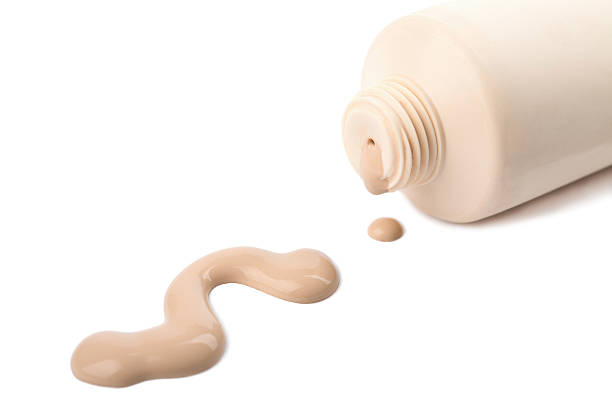 istock liquid foundation spilled out of bottle isolated 120705284