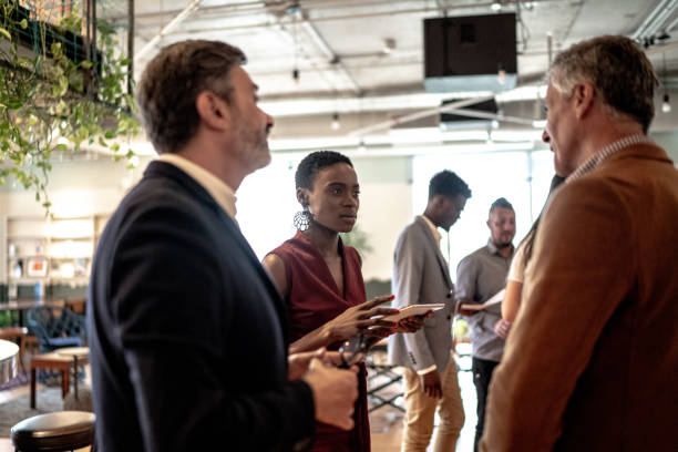 istock Business people talking at seminar 1207055897
