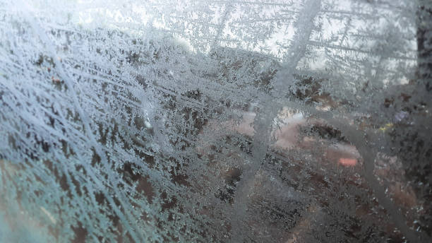 istock Frost on glass in winter 1207055966