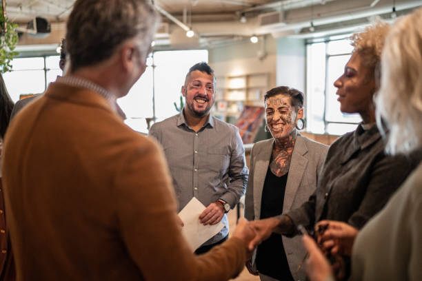 istock Business people shaking hands at business event 1207056365