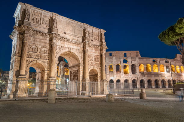 istock Arch of Constantine and Colosseum at night 1207056784