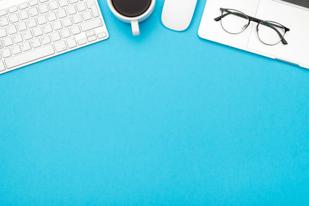 istock Workspace on color desk in home office with copy space for your design. Top view. Flat lay 1207057410