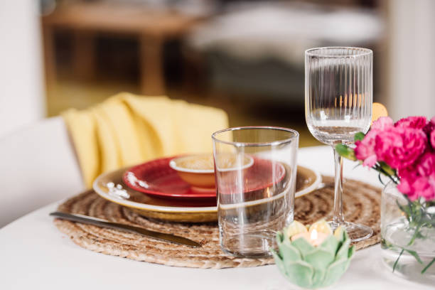 istock Colorful place setting indoors in dining room on kitchen table crockery and cutlery 1207057743