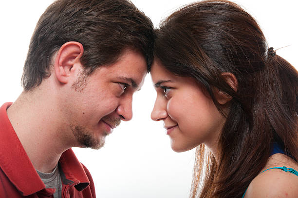istock Young beautiful couple looking each others eye 120705871