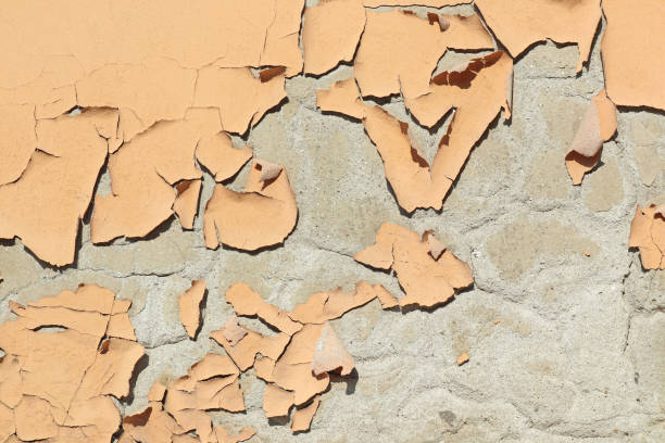 istock Old weatherd stained wall of a building 1207059102