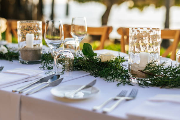 istock Table setting at a luxury wedding and Beautiful flowers on the table. 1207059149