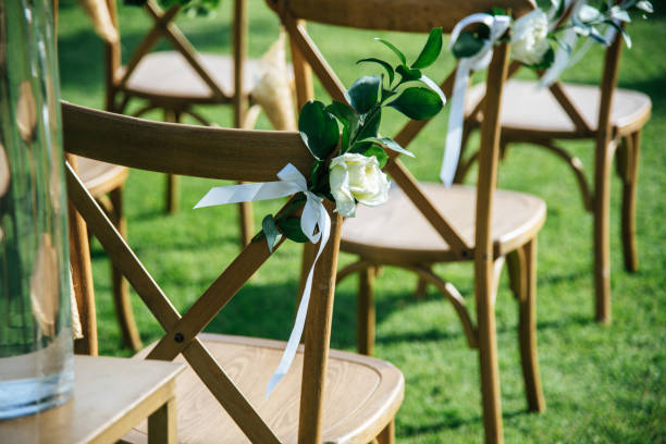 istock Wedding ceremony. Arch, decorated with flowers on the lawn. 1207059244