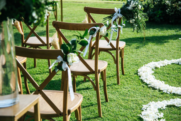 istock Wedding ceremony. Arch, decorated with flowers on the lawn. 1207059260